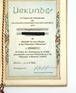 DDR NVA Urkunde Medaille für treue Dienste in der NVA Silber 1962 Hauptfeldwebel