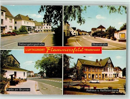 Flammersfeld Siebengebirgsstraße Rheinstraße Partie am Brunnen Rathaus und Raiffeisenbank
