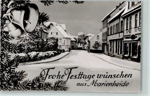 Marienheide Ortsansicht Tannenzweige Glocken Winteraufnahme