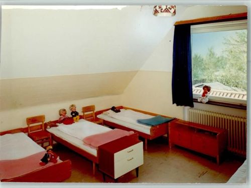 Haffkrug Haus Marion Innenaufnahme Schlafraum Puppen