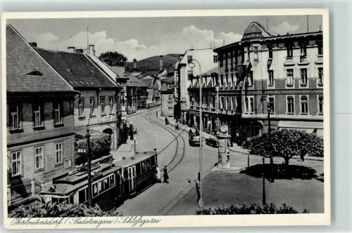 Litvinov WK II Schlossgasse Straßenbahn Litfaßsäule Auto Geschäfte Tram Brüx