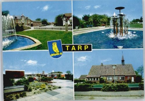 Tarp Springbrunnen Laterne Zaun Wiese Haus Baum Bank