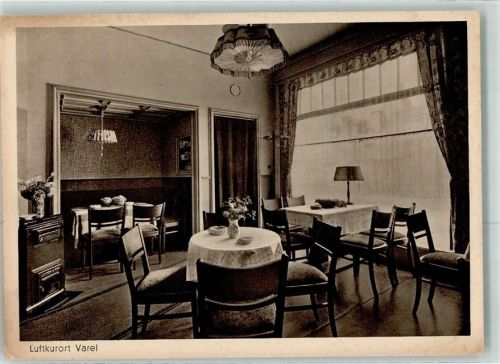 Varel Kaffeestube Eisstube zur Mühle Cafe Inneres Blumen Lampe Tisch Stuhl