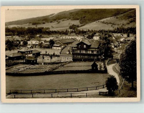 Ruhpolding St. Annahaus Gartenseite mit Liegehalle