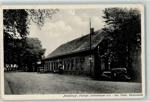 27749 W2870 Delmenhorst Gebrauchsspuren Gasthaus Heidekrug Straßenuhr Emailleschild