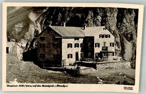 Kemptner Hütte Berghütte auf dem Mädeljoch Fotograf Hugo Mauch Hüttenstempel