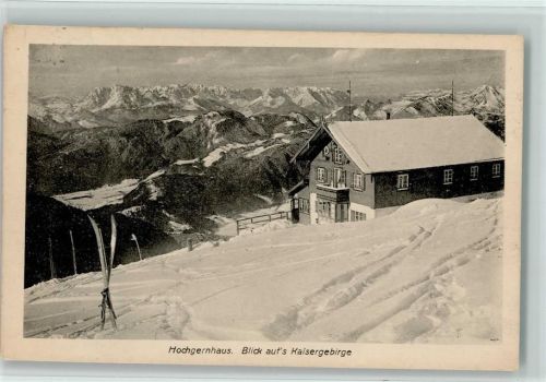 Hochgernhaus Blick auf das Kaisergebige Winteraufnahme Hüttenstempel