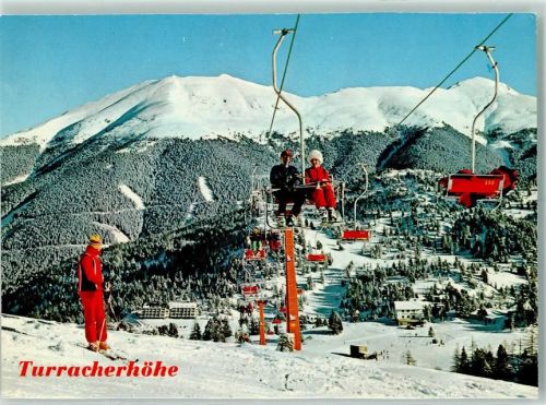 Turracherhöhe Kornock-Sessellift gegen Eisenhut Winter Skifahrer