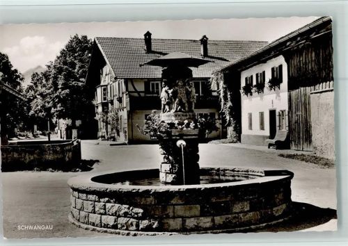 Schwangau Straßenpartie mit Brunnen