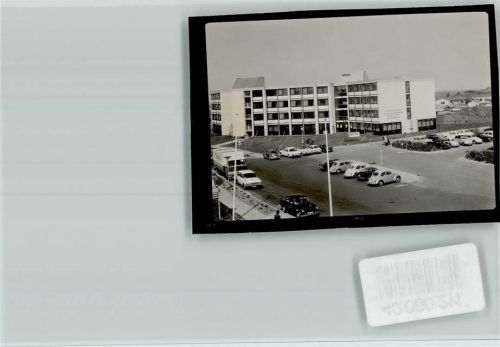 Weißenhaus VW Käfer vor Appartement Park