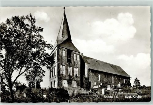 Sande Evangel. Kirche Rückseite mit Abschürfungen bzw Kleberesten