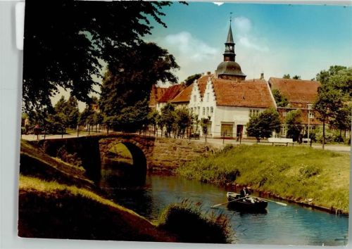 Friedrichstadt Ruderer durch die Gracht, Hintergrund Lutherische Kirche