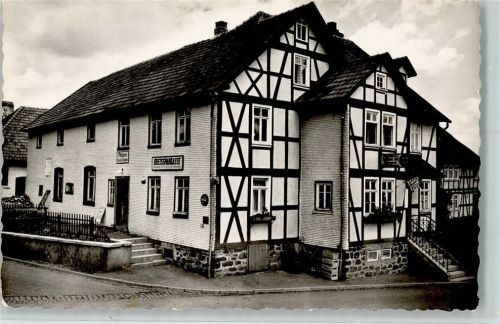 Ilbeshausen Gasthaus Hessischer Hof Fachwerkhaus Wegweiser Kreissparkasse