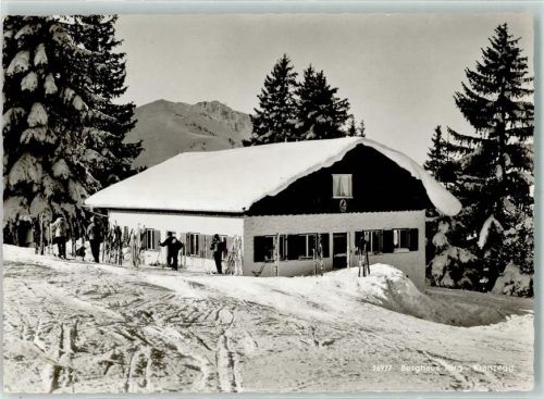 Kranzegg Berghaus Jörg Winter Skifahrer Rückseite mit Abschürfungen bzw Kleberesten