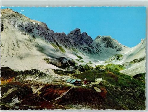 Ulmer Hütte Ulmer Hütte mit Valluga Jahnturm und Walfagehrjoch Hüttenstempel