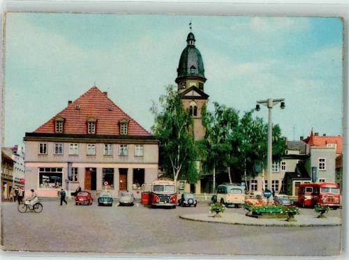 Waren Neuer Markt Reisebusse Kirche Fahradfahrerin