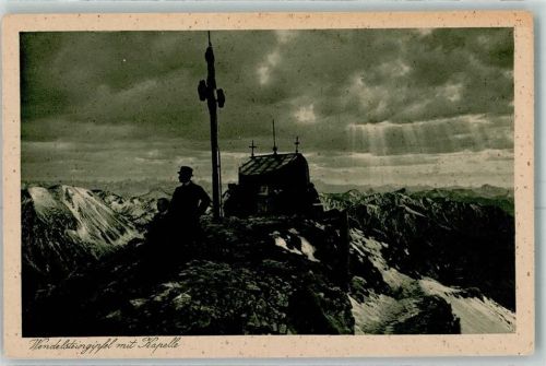 Bayrischzell Wendelsteingipfel Gipfelkreuz Kapelle Mann Wolken