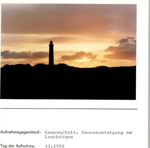 Kampen Sonnenuntergang am Leuchtturm Foto montiert auf Karton