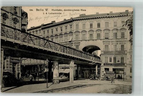 10115 O1020 Friedrichshain 1911 - Litfaßsäule Geschäft durchbrochenes Haus Hochbahn