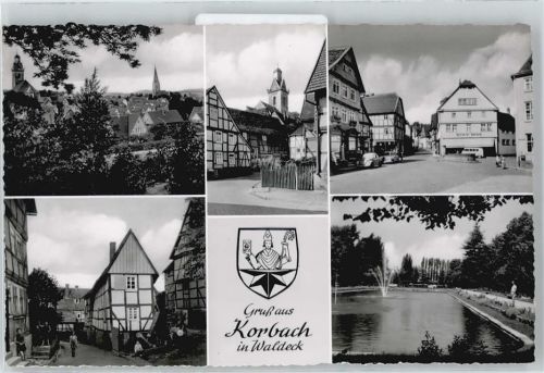 Korbach Springbrunnen Teich Baum Haus Zaun Straße Fußgänger