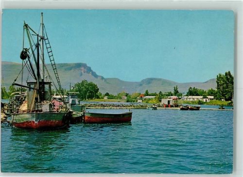 Ginosar On the Shore of Lake of Galilee In the BAckground Mt. Arbel
