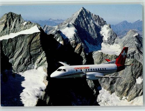 Crossair Cityliner über den Schweizer Alpen AK