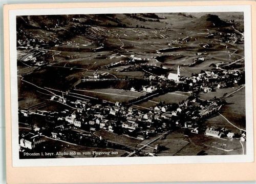 Pfronten 1931 Fliegeraufnahme des Ortes mit Pfarrkirche St. Nikolaus Original aufmontierte Verlagsmusterkarte
