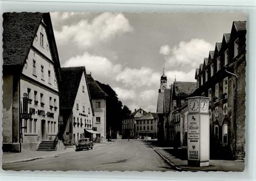 88410 W7954 Bad Wurzach Foto AK Litfaßsäule mit Uhr, gute Erhaltung AK