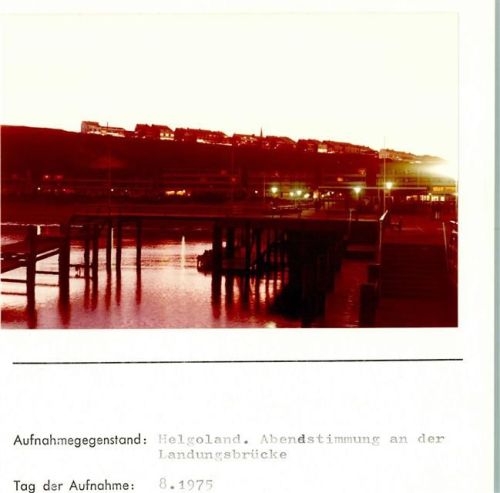 Helgoland Sonnenuntergang Landungsbrücke Foto montiert auf Karton