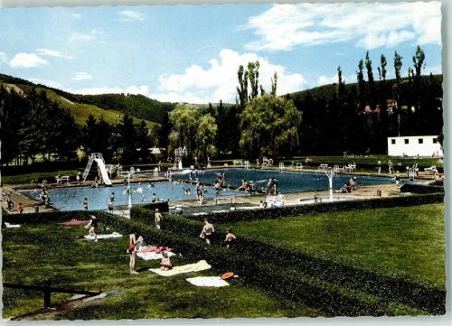 Wittlich Rückseite mit Abschürfungen und Kleberesten Schwimmbad