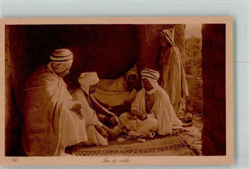 Männer in landestypischer Kleidung beim Kartenspiel Arab. Volkstyp 1930