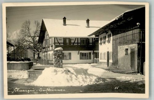 87645 W8959 Schwangau Foto AK Dorfbrunnen Winter Schnee Haus Hitzl