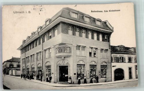 79539 W7850 Lörrach 1916 - Baslerstrasse Ecke Kirchstrasse Geschäft Knopf