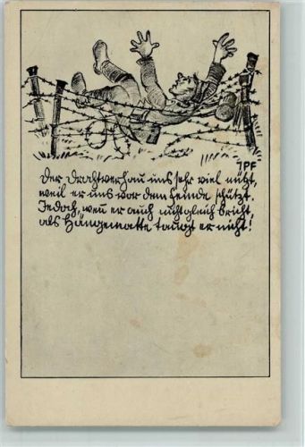 Soldat liegt im Stacheldraht