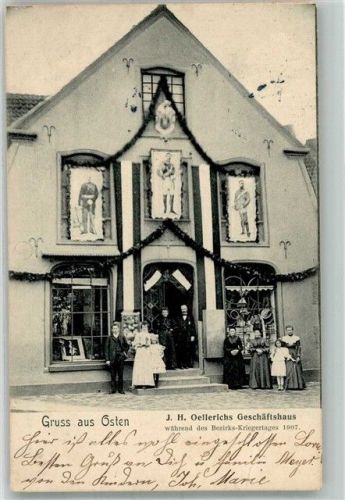21756 W2176 Osten , Oste 1912 Gebrauchsspuren Geschäftshaus Oellerich Fassadenschmuck während des Bezirks-Kriegertages 1907