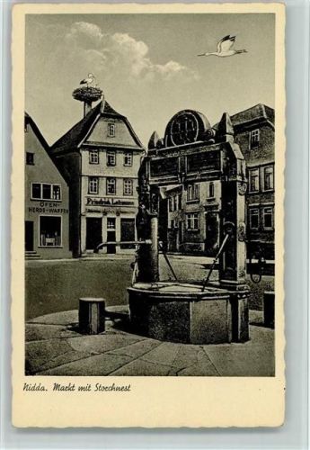 63667 W6478 Nidda - Markt mit Storchennest Brunnen