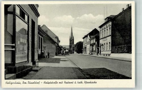 Heiligenhaus Hauptstraße mit Postamt u. Kath Pfarrkirche Oldtimer