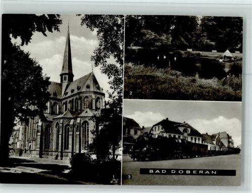 Bad Doberan Klosterkirche im Sebastian-Bach-Garten Bäderbahn