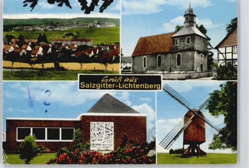 Salzgitter Kirche Uhr Mühle Blumen Gesamtansicht