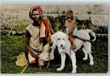 Der Affe Walla reitet auf einem Hund Affe