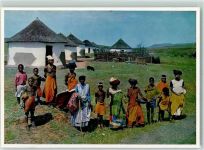 A Happy Group of Xhosa People in their traditional Red Blankets and Pipe Smoking Women Motiv Südafrika