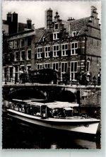Amsterdam Grachtenboot am Haus an den drei Kanälen Binnenschiff Foto AK