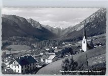 6152 Trins - Kirche, Gesamtansicht mit Blick auf Feuersteine