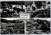 56290 W5449 Lütz - Ortsschild, Gesamtansicht, Bachpartie
