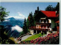6384 Waidring - Alpengasthaus Steinplatte Blick gegen Kitzbüheler Horn und Hohe Tauern Großvenediger Hüttenstempel