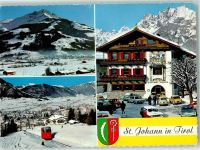 6380 St. Johann in Tirol - Kitzbüheler Horn Hauptplatz mit Wilden Kaiser Bergbahn St. Johann Winter
