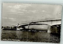41460 W4040 Neuss Foto AK Rheinschiff Raddampfer unterquert die Rheinbrücke