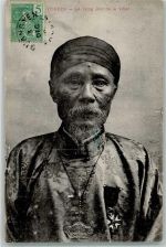 Hanoi Foto AK Tracht Mann Briefmarke Bildseite