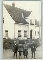 89264 W7912 Schießen Foto AK Wohnhaus Coiffeurgeschäft Ort handschriftlich