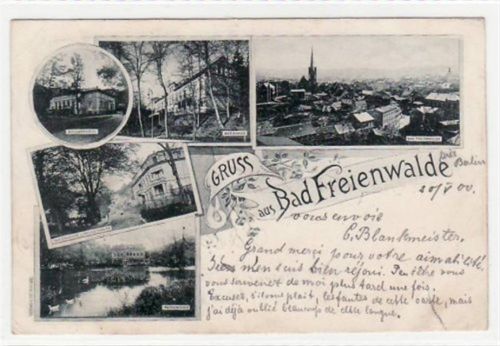 Bad Freienwalde Lithographie. Gruß aus Bad Freienwalde. Totalansicht, das Berghaus, Brunnenhotel, Waldschloss und Heilige Hallen Pappenmühle. befördert mit Marke 1900. Kleiner Knick an der oberen linken Ecke, sonst gut erhalten.